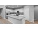 Contemporary kitchen boasting stainless steel appliances, ample counter space, and abundant storage at 17812 W Getty Dr, Goodyear, AZ 85338