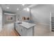 Expansive living room showcasing an open layout, tall ceilings, and modern flooring at 17812 W Getty Dr, Goodyear, AZ 85338