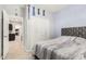 Bedroom with view into hallway and kitchen area, features closets at 18036 N 49Th St, Scottsdale, AZ 85254