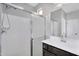 Bathroom featuring a shower with a glass door and a vanity with white countertops at 1961 E Stacey Rd, Gilbert, AZ 85298