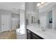 Bathroom featuring a soaking tub and separate shower with white cabinets and countertops at 1961 E Stacey Rd, Gilbert, AZ 85298