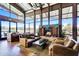 Relaxing clubhouse lounge area with inviting seating, a warm fireplace, and beautiful views at 1961 E Stacey Rd, Gilbert, AZ 85298