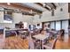 Clubhouse kitchen and dining area with modern appliances, ample seating, and stylish finishes at 1961 E Stacey Rd, Gilbert, AZ 85298