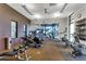 Well-equipped gym with various machines, ample space, and natural light for a healthy workout at 1961 E Stacey Rd, Gilbert, AZ 85298