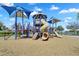 Fun-filled community playground featuring slides, climbing structures, and shaded areas for children at 1961 E Stacey Rd, Gilbert, AZ 85298