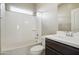 Clean bathroom featuring a tub/shower combination and vanity with dark wood cabinets at 22302 E Camina Plata --, Queen Creek, AZ 85142