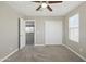 Comfortable bedroom features a large closet and neutral wall to wall carpet at 22302 E Camina Plata --, Queen Creek, AZ 85142