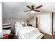 Charming bedroom featuring natural light, a sloped ceiling and a comfortable bed at 2644 E Sylvia St, Phoenix, AZ 85032