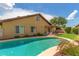 Backyard pool with lounge chairs, patio, and lush landscaping at 2644 E Sylvia St, Phoenix, AZ 85032