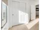 Bedroom featuring neutral carpet and closet with sliding doors at 2656 E Longhorn Pl, Chandler, AZ 85286