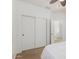 Bedroom featuring neutral carpet and a closet with sliding doors at 2656 E Longhorn Pl, Chandler, AZ 85286