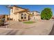 Corner-lot home with well-maintained desert landscaping, a two-car garage and clay tile roof at 2656 E Longhorn Pl, Chandler, AZ 85286