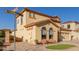 Corner-lot home with well-maintained desert landscaping, a two-car garage and clay tile roof at 2656 E Longhorn Pl, Chandler, AZ 85286