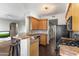 Well-equipped kitchen with stainless steel appliances, breakfast bar, and ample cabinet space for storage at 29606 N Tatum Blvd # 128, Cave Creek, AZ 85331
