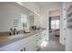 Stylish bathroom with double sinks, decorative mirror, and a neutral color palette at 3015 W Irvine Rd, Phoenix, AZ 85086