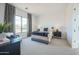 Serene bedroom featuring natural light, neutral palette, and luxurious bedding at 38Xxx N 31St Ave, Phoenix, AZ 85086