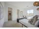 Bright bedroom featuring twin beds, neutral walls, a walk-in closet, and natural light at 3015 W Irvine Rd, Phoenix, AZ 85086