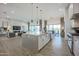 Spacious kitchen flows to the living area, featuring modern appliances and ample counter space at 38Xxx N 31St Ave, Phoenix, AZ 85086