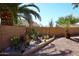 Backyard featuring desert landscaping and privacy wall creates a tranquil and low-maintenance outdoor space at 4152 N Signal Cir, Mesa, AZ 85215