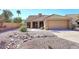 Charming single-story home with desert landscaping and a tile roof at 4152 N Signal Cir, Mesa, AZ 85215