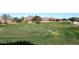 Scenic golf course features rolling greens with mountain views, ideal for enjoying a round in a picturesque setting at 4152 N Signal Cir, Mesa, AZ 85215