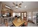 Eat-in kitchen featuring a breakfast bar, ample countertop space, and wooden cabinets at 4152 N Signal Cir, Mesa, AZ 85215