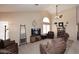 Spacious living room featuring vaulted ceilings, plush seating, and neutral tones at 4152 N Signal Cir, Mesa, AZ 85215