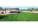 Covered picnic area and playground featuring picnic tables, a BBQ, and playground equipment at 4152 N Signal Cir, Mesa, AZ 85215