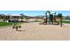 Community playground with various play structures and equipment for children at 4152 N Signal Cir, Mesa, AZ 85215