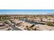 Beautiful aerial view of an attractive neighborhood, well maintained landscaping and a scenic water feature at 41960 W Ellington Ln, Maricopa, AZ 85138