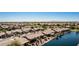 Wonderful neighborhood featuring numerous homes, beautiful landscaping, and a serene water feature at 41960 W Ellington Ln, Maricopa, AZ 85138
