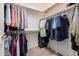 Spacious walk-in closet with ample shelving and hanging space at 41960 W Ellington Ln, Maricopa, AZ 85138