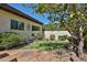 A backyard featuring a putting green and colorful landscaping at 4708 E Euclid Ave, Phoenix, AZ 85044