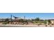 Enjoy a community park with playground, covered seating, lush landscaping, and walking paths at 4927 S 106Th Ave, Tolleson, AZ 85353
