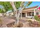 The landscaped backyard has a covered patio and pavers at 5032 N 78Th St, Scottsdale, AZ 85250
