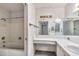 Bathroom featuring shower-tub combo, sink and vanity with storage at 5032 N 78Th St, Scottsdale, AZ 85250