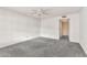 This bedroom has a ceiling fan and a large closet at 5032 N 78Th St, Scottsdale, AZ 85250