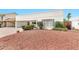 Charming single-story house with desert landscaping and a convenient attached carport at 5032 N 78Th St, Scottsdale, AZ 85250
