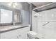 Modern bathroom with marble-look shower, sleek vanity, and updated fixtures at 540 Leisure World --, Mesa, AZ 85206