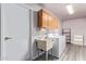Functional laundry room with sink, storage, and modern appliances at 540 Leisure World --, Mesa, AZ 85206