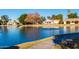 Waterfront community with a lake featuring a fountain and lush green space at 540 Leisure World --, Mesa, AZ 85206