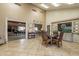 Inviting community room with comfortable seating, a library, and elegant decor for social gatherings at 5757 W Eugie Ave # 2081, Glendale, AZ 85304
