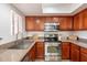 Updated kitchen featuring stainless steel appliances and natural light at 5757 W Eugie Ave # 2081, Glendale, AZ 85304