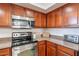 Well-equipped kitchen with stainless steel appliances and granite countertops at 5757 W Eugie Ave # 2081, Glendale, AZ 85304