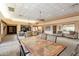 Comfortable resident lounge with ample seating, community table and media center at 5757 W Eugie Ave # 2081, Glendale, AZ 85304