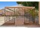 Backyard gazebo with fairy lights, surrounded by foliage at 5867 W Cochise Dr, Glendale, AZ 85302