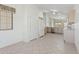 Bright kitchen featuring white appliances, tile flooring, and natural light at 5867 W Cochise Dr, Glendale, AZ 85302