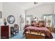 This main bedroom features vaulted ceilings and stylish furnishings at 5867 W Cochise Dr, Glendale, AZ 85302