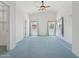Spacious main bedroom with vaulted ceiling, carpet, dual windows, and ensuite access at 5867 W Cochise Dr, Glendale, AZ 85302