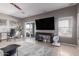 Living room with tile floors, and a ceiling fan at 6618 S 54Th Ln, Laveen, AZ 85339